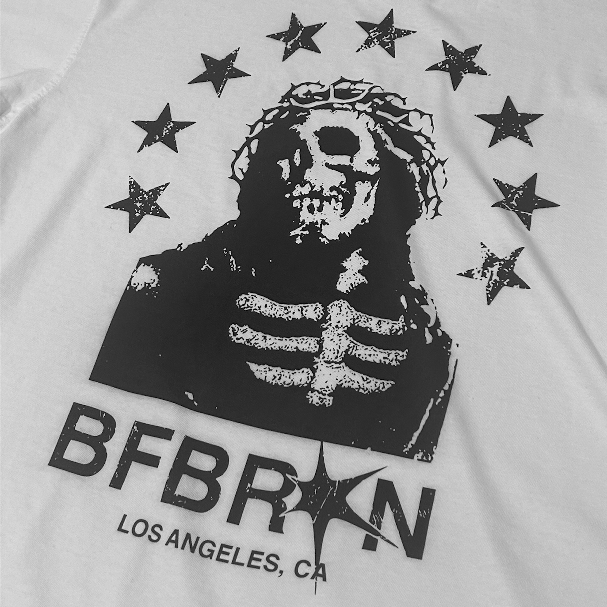 T-shirt with a skeleton design and 'BFBRKN' text on a white background